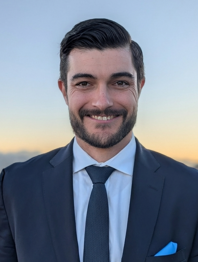 Man in a suit with a blurred background